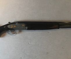 FN B25 met platines en goud gravure loop 70cm.